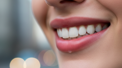 Close-up of a person's mouth, showcasing a perfectly healthy, naturally white and bright smile with gently curved lips, against a softly blurred, abstract background hinting at an urban UK setting.